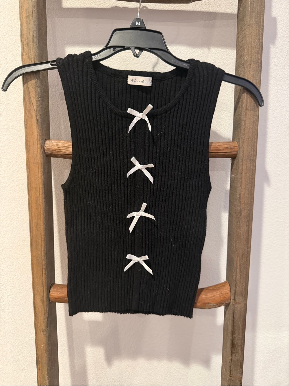 Active USA Black Ribbed Sleeveless Knit Top with White Bow Accents